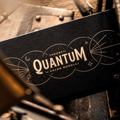Black box with 'Quantum' branding on a wooden surface