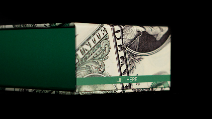Money clip with dollar bill design on a black background