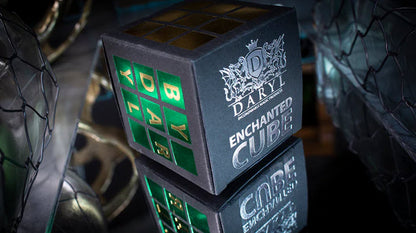 Daryl Enchanted Cube with green and blue lights on a reflective surface
