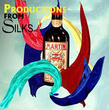 Bottle of Martinelli's fruit drink with colorful fabric in the background and text 'Productions from Silks'.