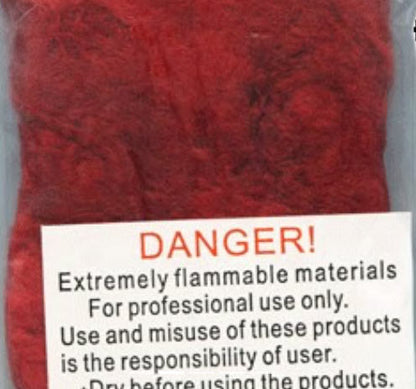 Red material in a clear package with a danger label warning of flammability.