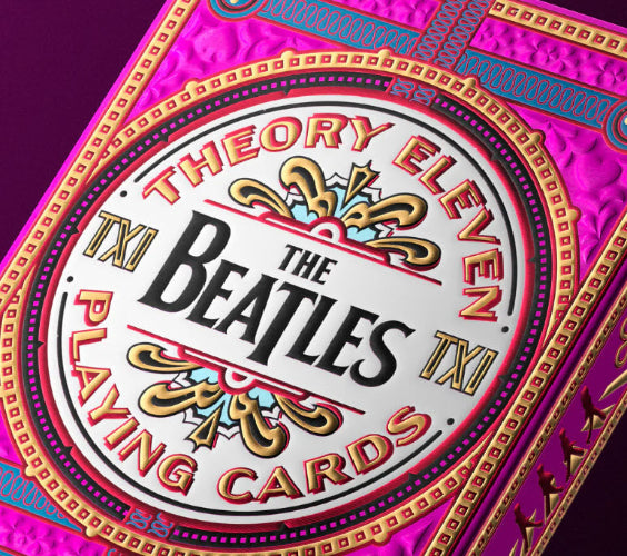 The Beatles playing cards packaging with decorative border