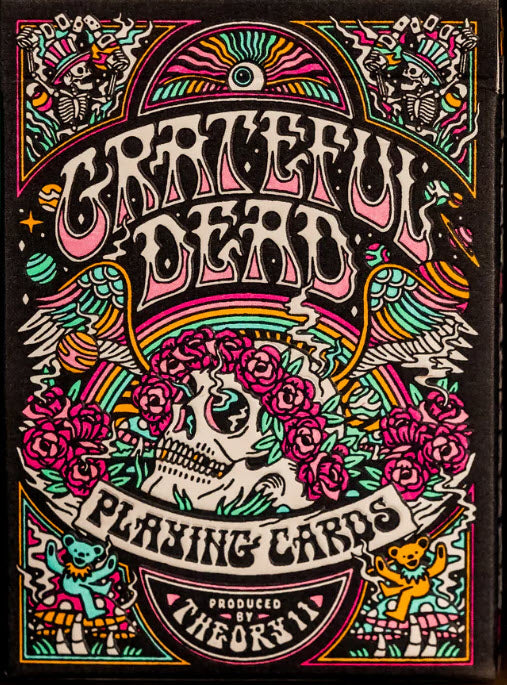 Colorful deck of cards packaging with a skull and floral design, featuring the brand 'Theory11'.