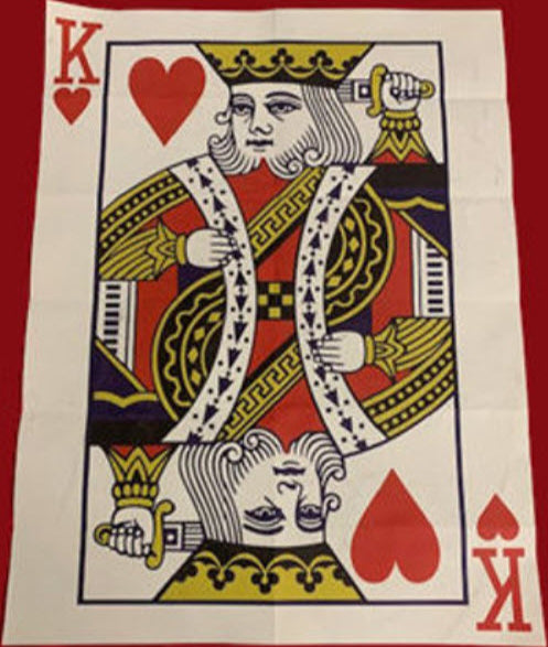 King of Hearts playing card on a red background