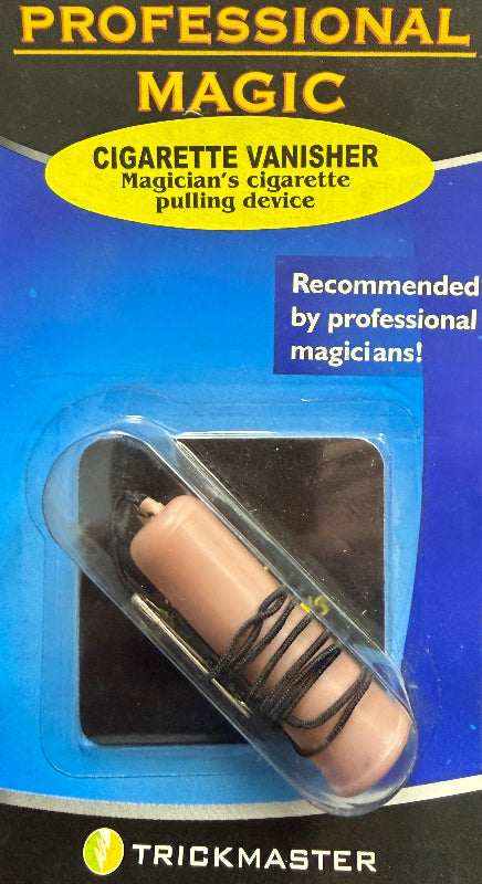 Cigarette vanisher in packaging with 'Trickmaster' branding on a dark surface.