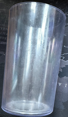 Clear plastic cup on a map of Russia