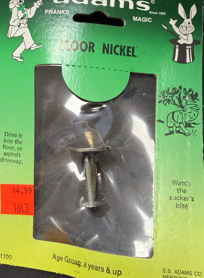 Packaged silver moor nickel on a green and yellow Adams packaging