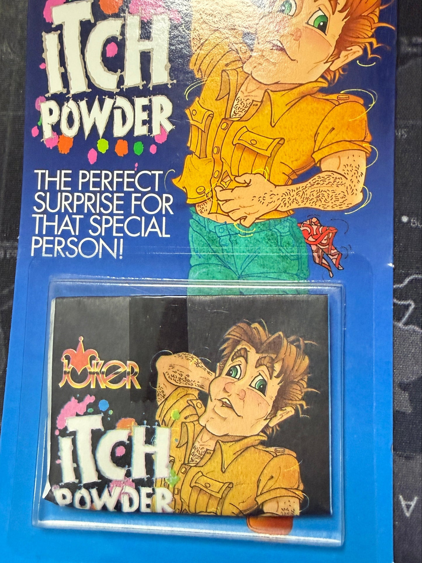 Packaged product with cartoon character on a dark surface