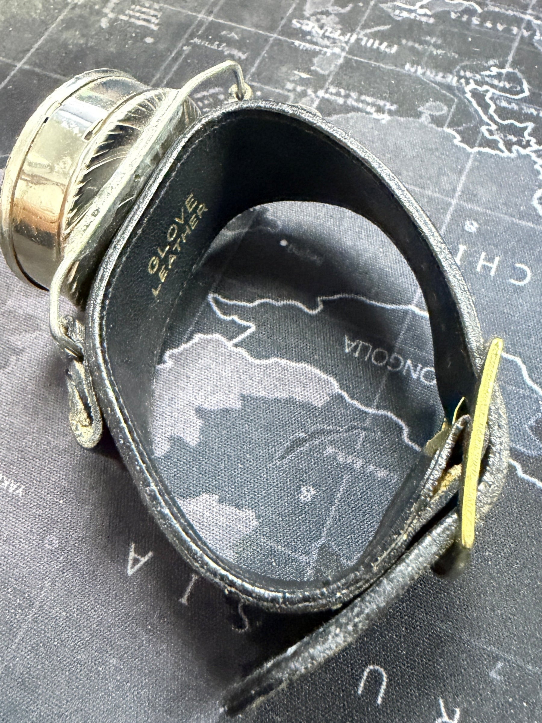 Vintage spyglass on a map background