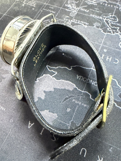 Vintage spyglass on a map background