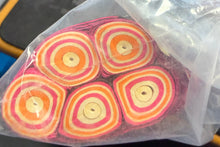 Pink, Yellow, Orange, and White Throw Streamers