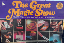 Vintage 'The Great Magic Show' illusion prop set packaging with images of magic tricks.