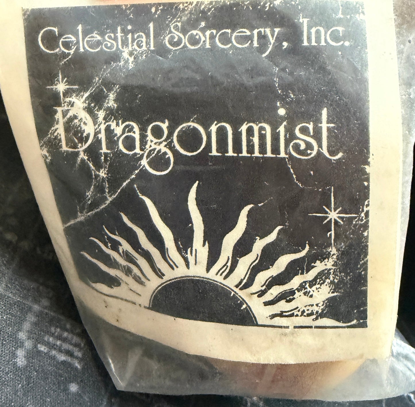 Product packaging with 'Celestial Sorcery, Inc.' branding on a star map background