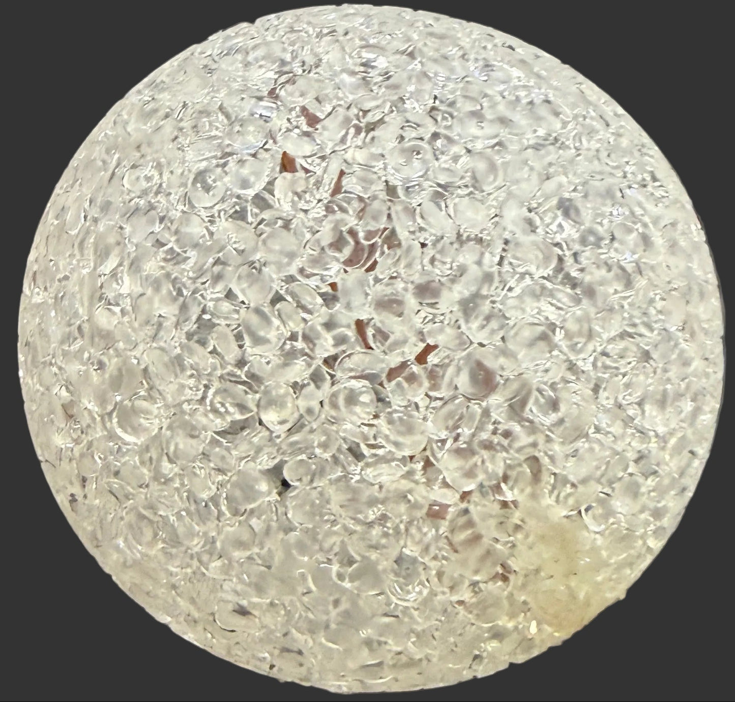 Round, textured object on a map of Russia