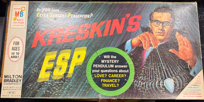 Kreskin's ESP board game box by Milton Bradley on a table.
