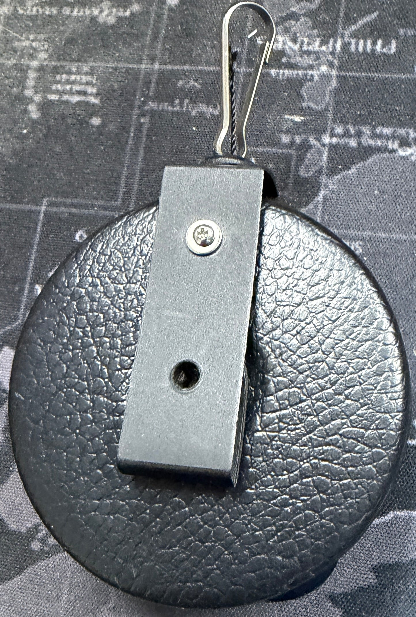 Retractable black belt on a world map background