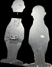 Wooden violin case with a map design on the interior