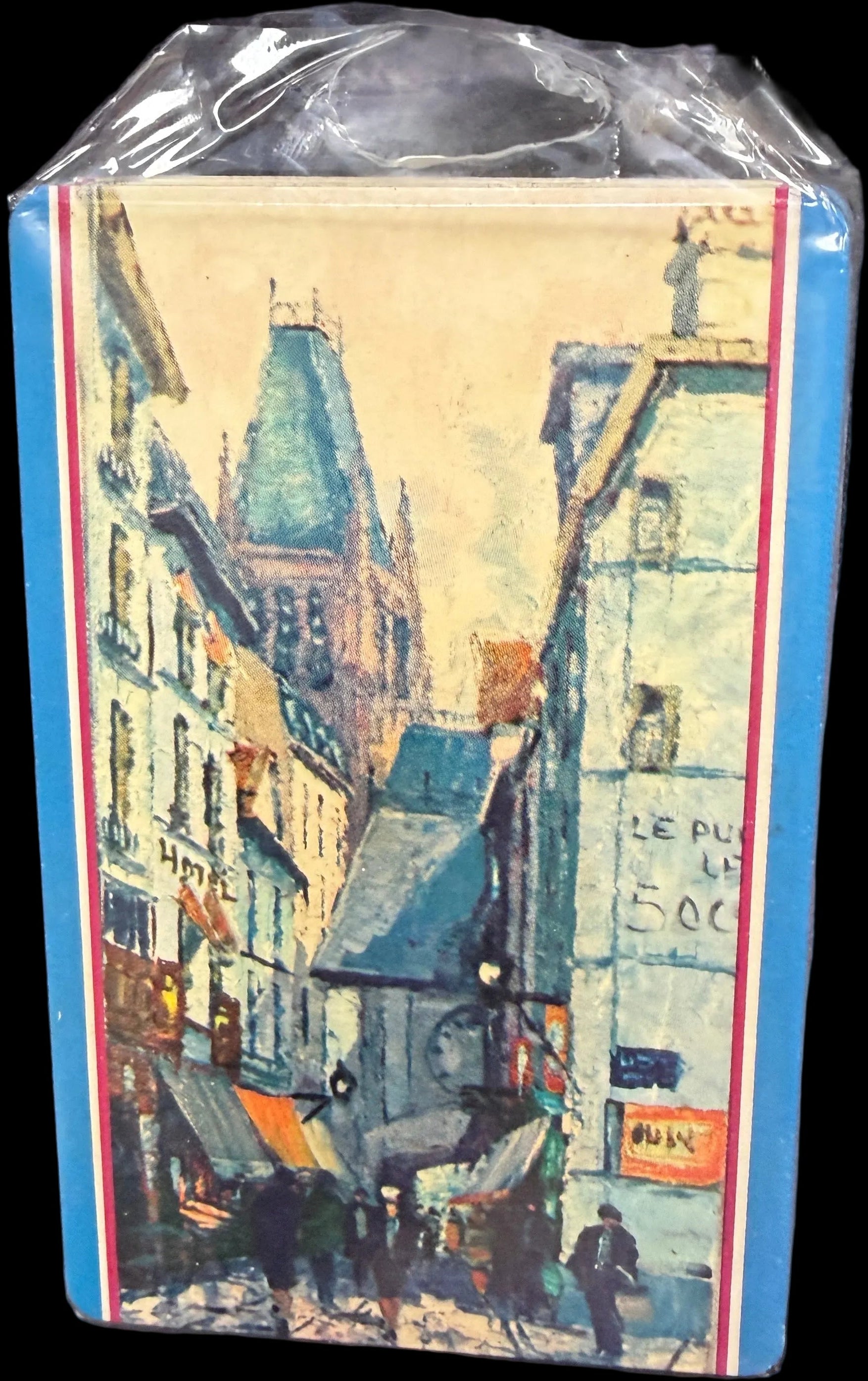 Small book or notebook with a colorful cover on a map background