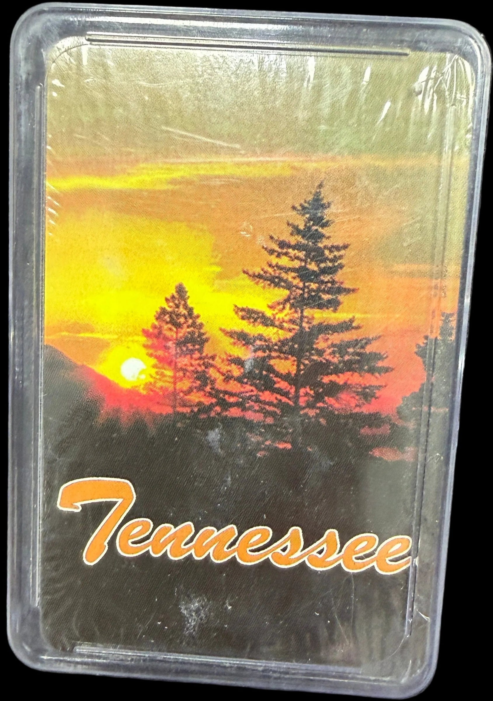 Tennessee-themed product packaging with sunset design on a map background