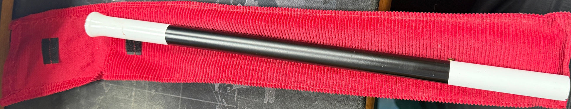 Black and white pen on a red background