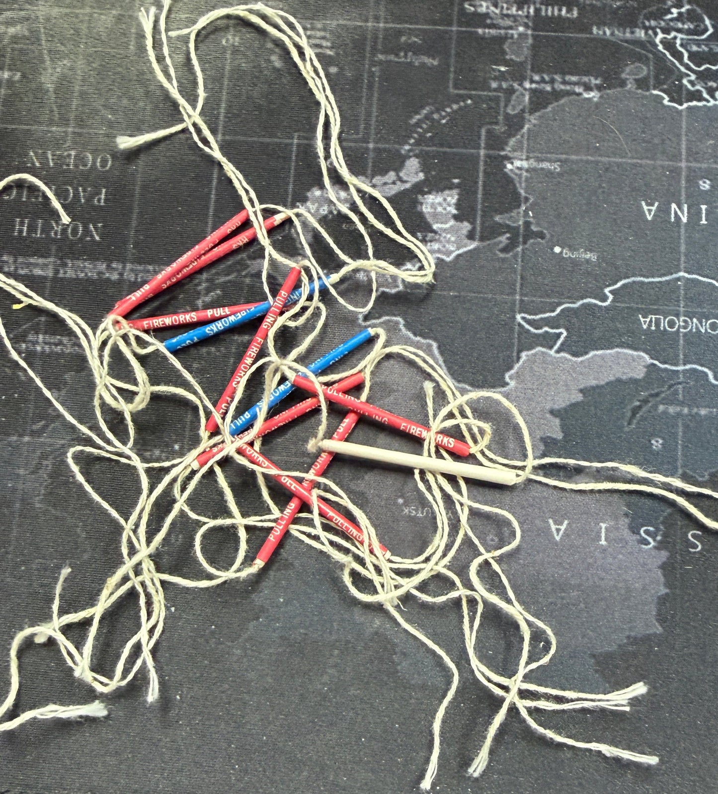 Tangled string on a map background