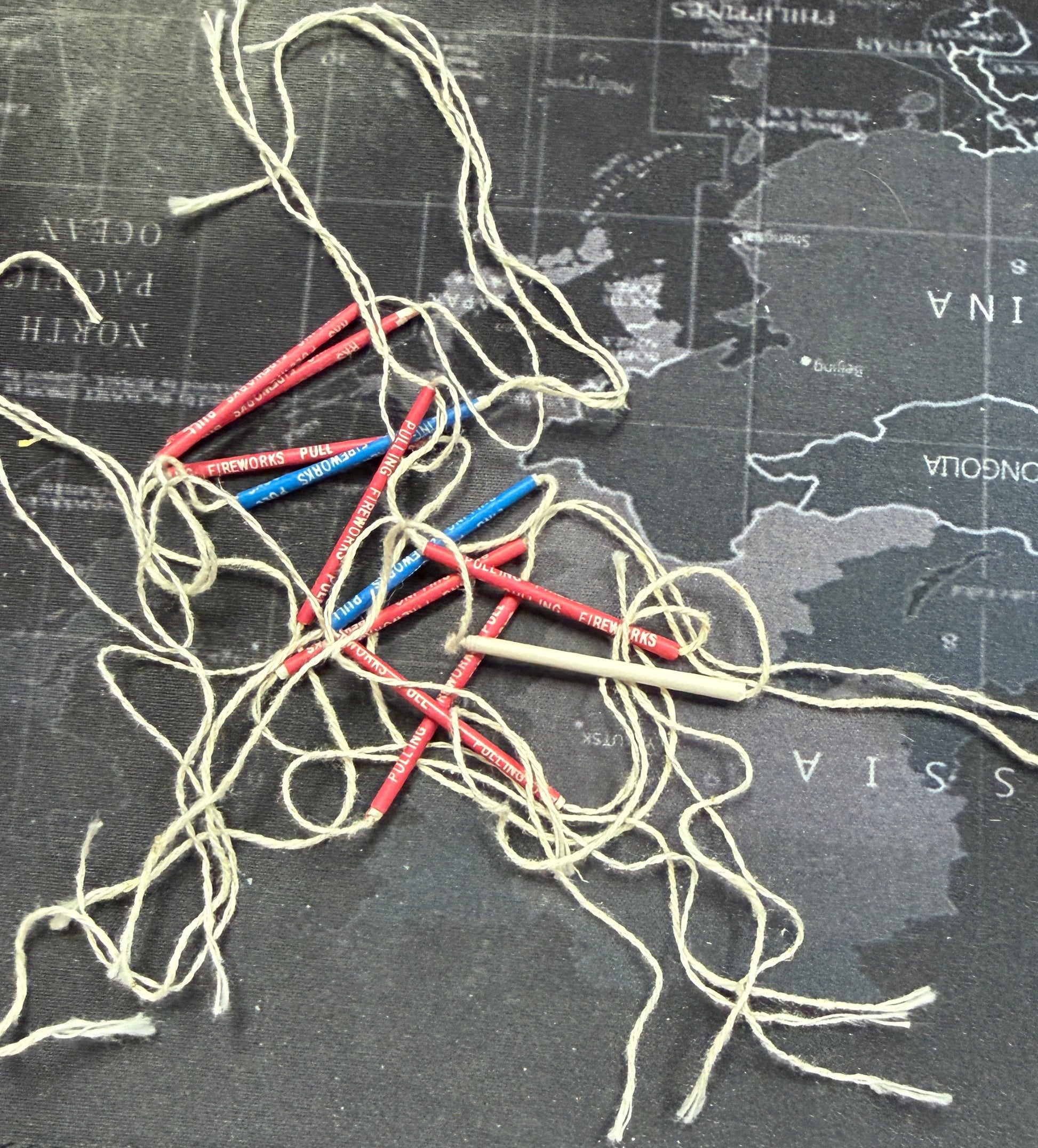 Tangled string on a map background