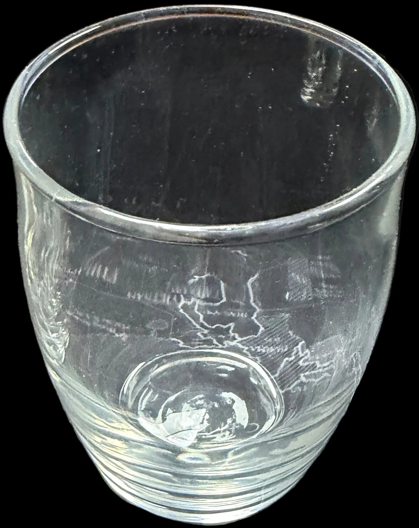 Two clear glasses on a map of Russia