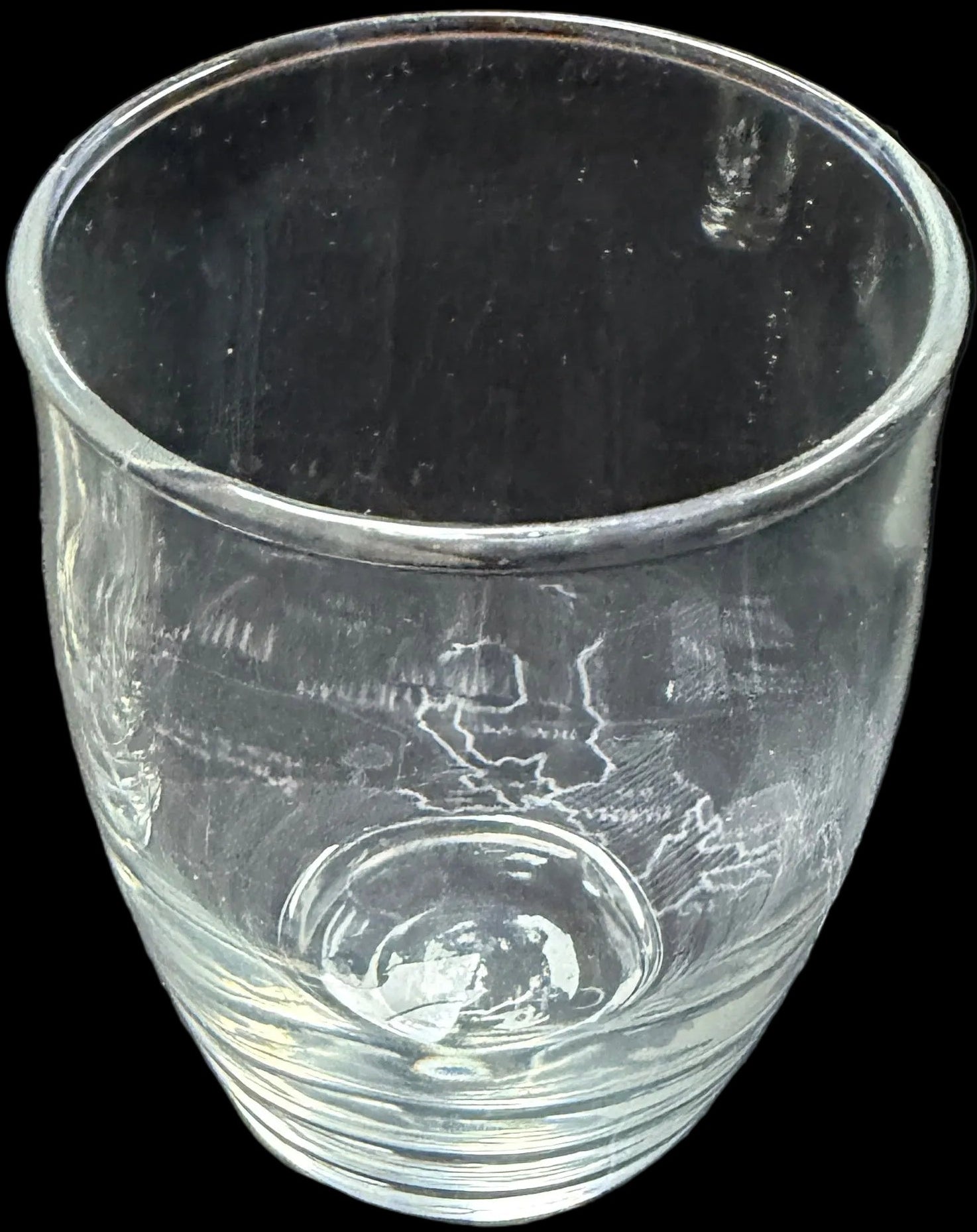 Two clear glasses on a map of Russia