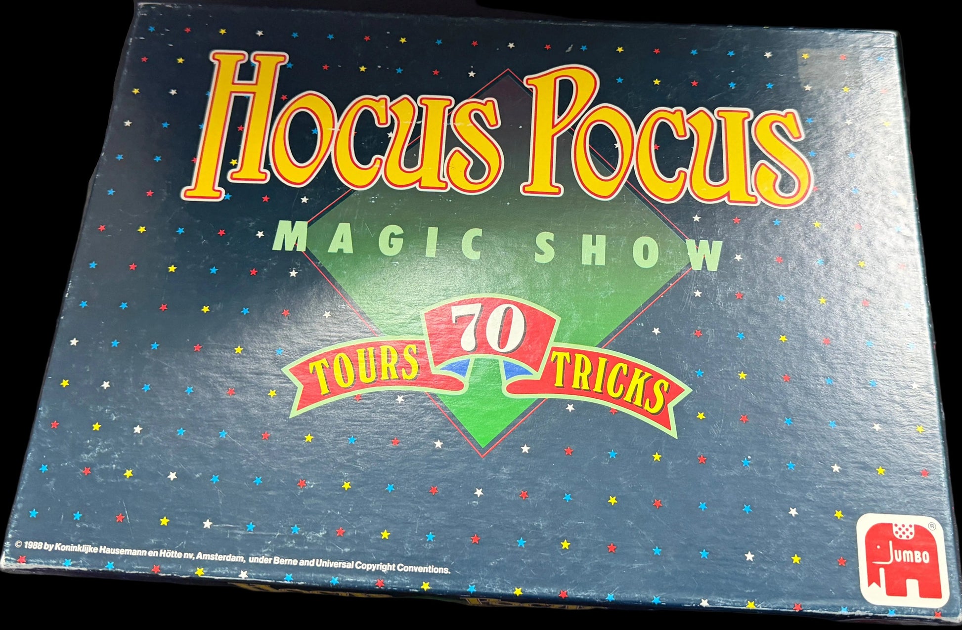 Hocus Pocus Magic Show box on a table with a shelf in the background