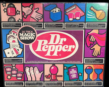 Dr Pepper magic show kit packaging with colorful illustrations on a dark background