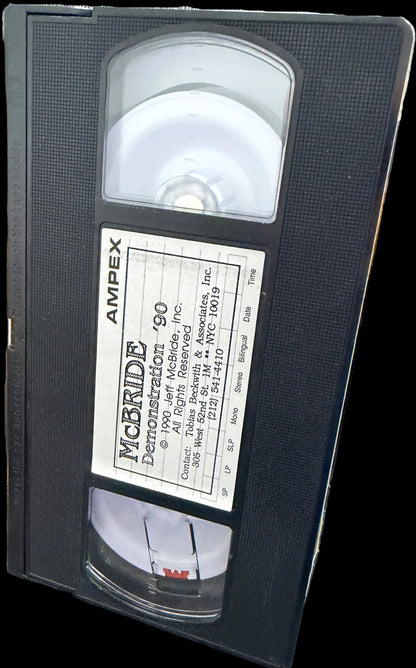 VHS tape with AMPEX branding on a map background