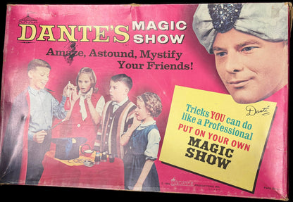 Vintage 'Dante's Magic Show' box with a magician and children on a pink background.