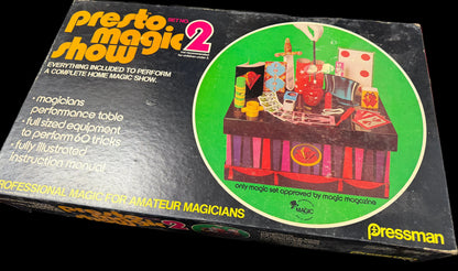 Presto Magic Show 2 packaging with a performance table illustration on a black background