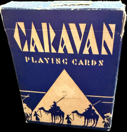 Vintage Marvyn playing cards on a world map