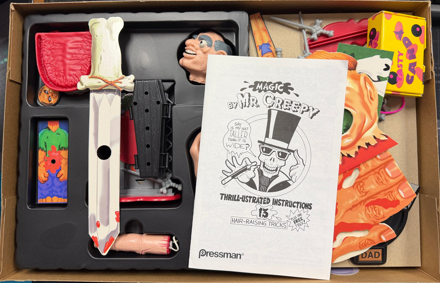 Toy set with a sword and figure in a box, featuring 'Mr. Creepy' branding.