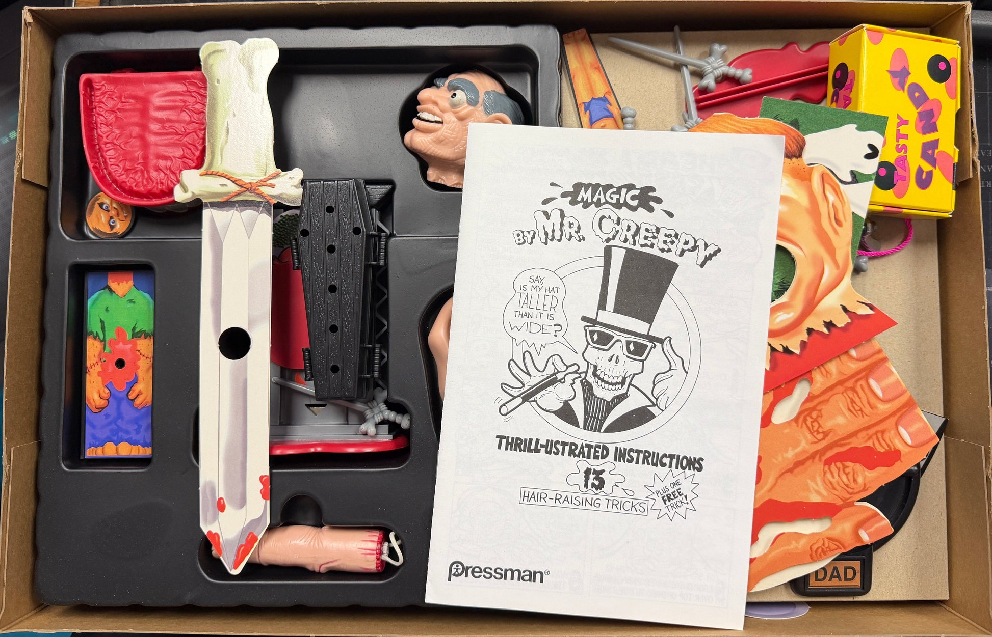 Toy set with a sword and figure in a box, featuring 'Mr. Creepy' branding.