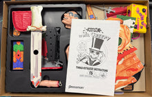 Toy set with a sword and figure in a box, featuring 'Mr. Creepy' branding.