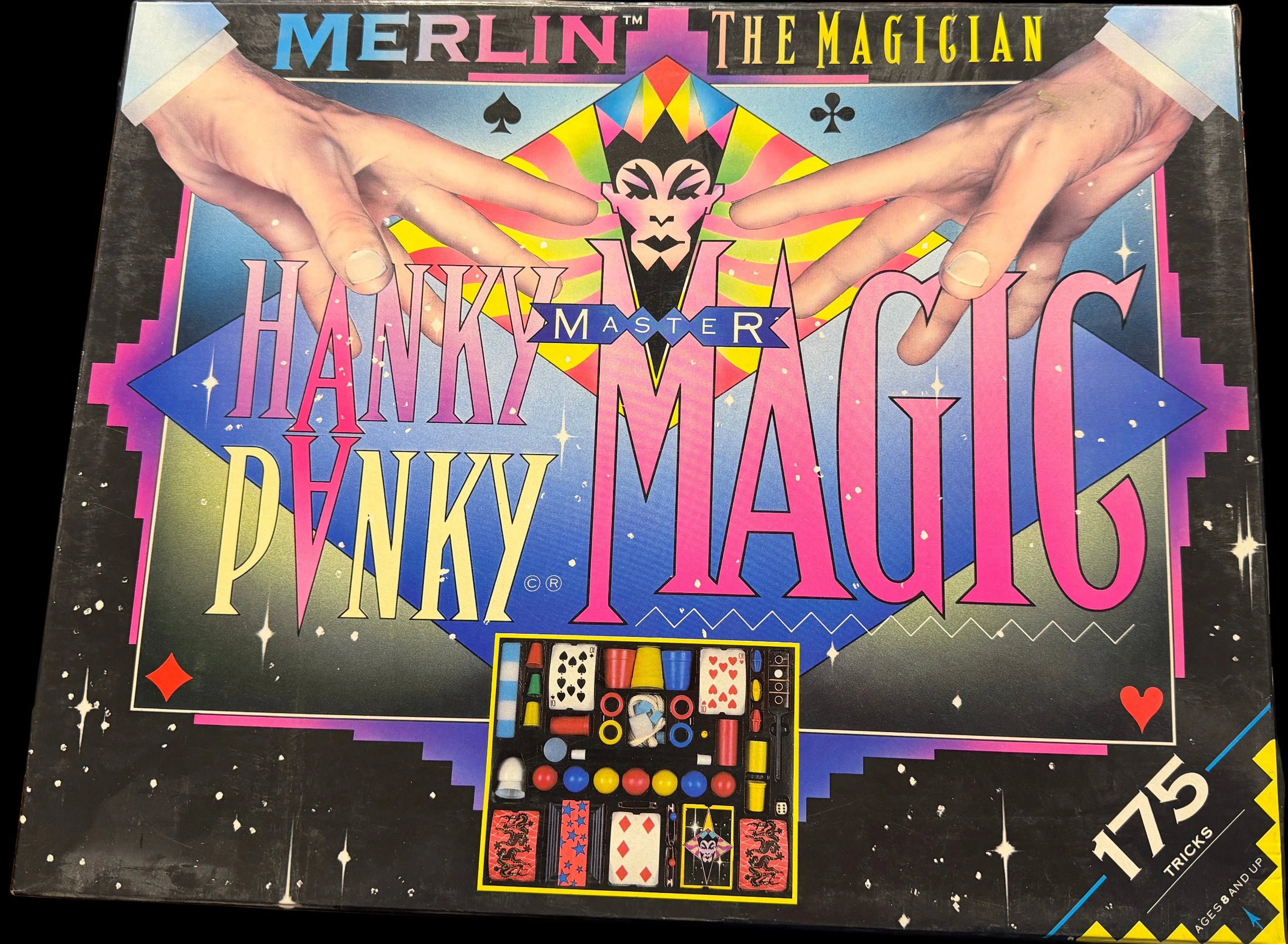 Hanky Panky Magic box with colorful design on a wooden table.