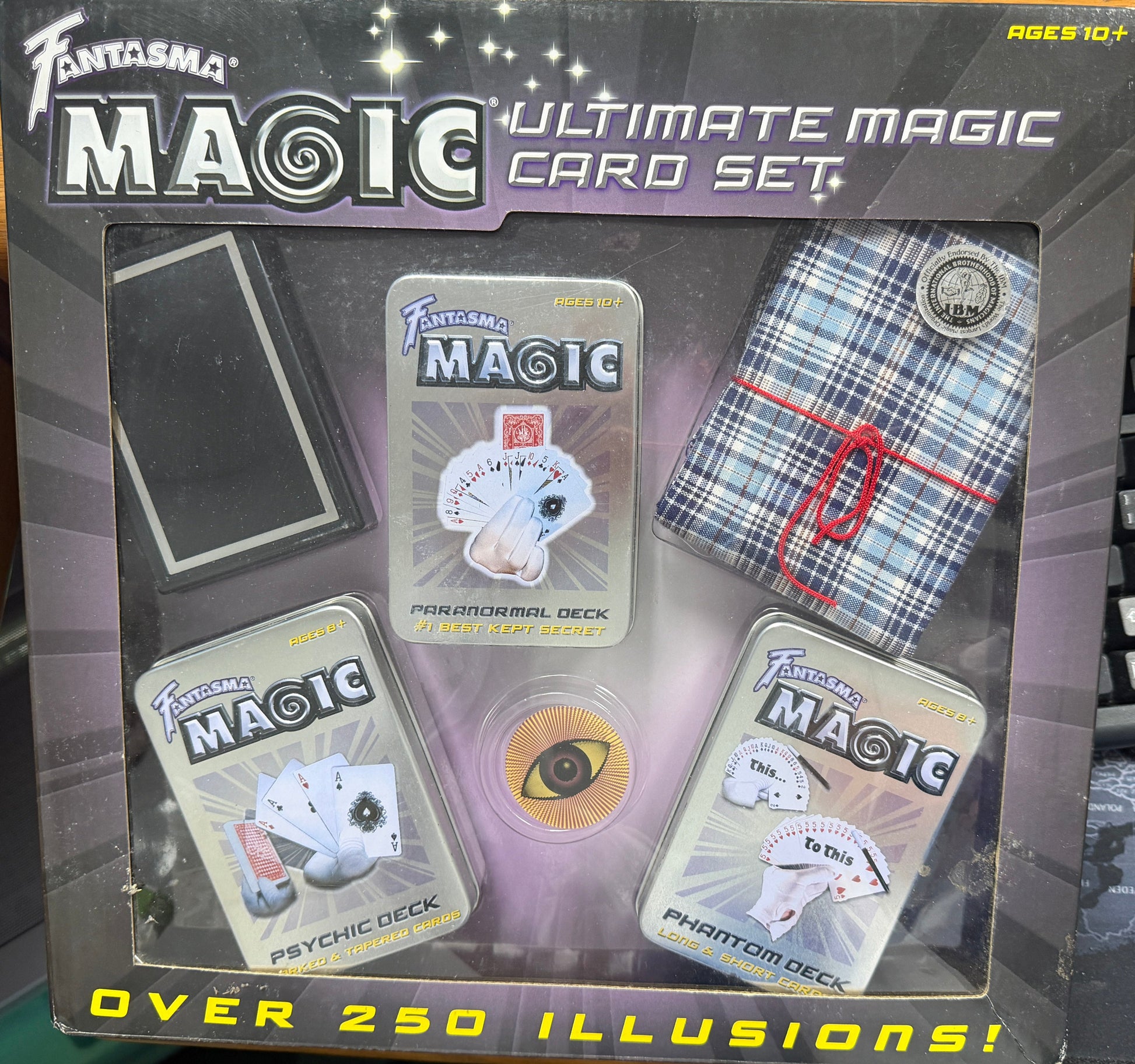 Fantasma Magic Ultimate Magic Card Set packaging on a desk with keyboard