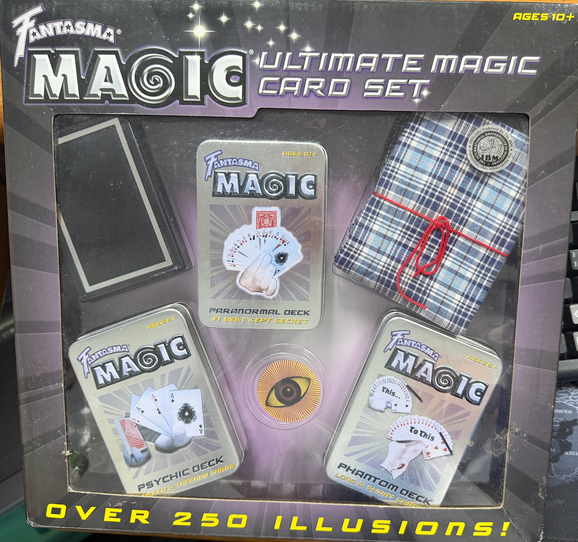 Fantasma Magic Ultimate Magic Card Set packaging on a desk with keyboard