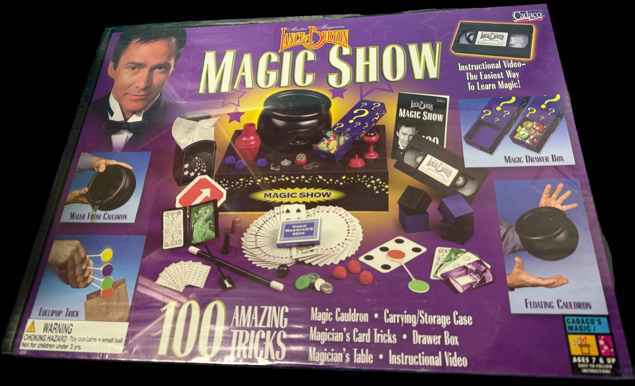 Vintage Magic Show kit packaging with images of magic tricks and a purple background.