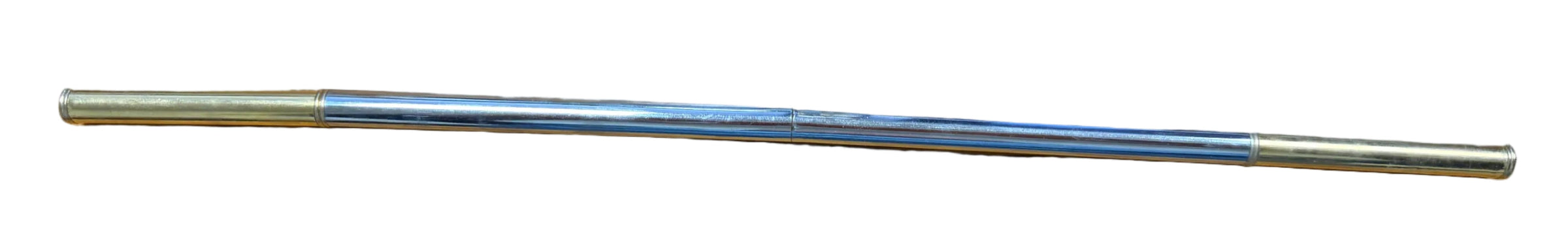 Metal rod on a wooden desk with a keyboard and map in the foreground