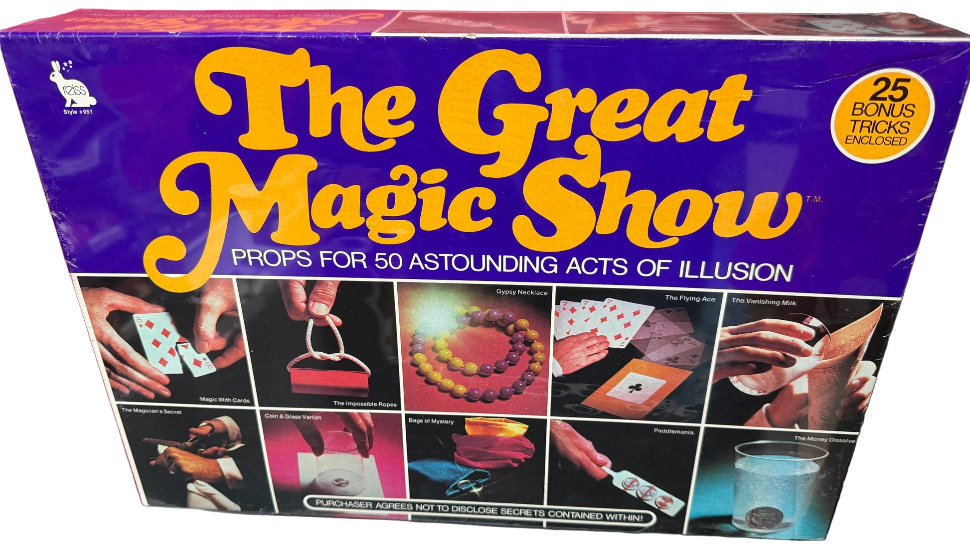 Box of 'The Great Magic Show' with images of magic tricks on a red background