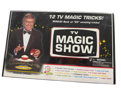 TV Magic Show packaging with a magician on the cover, displayed on a desk.