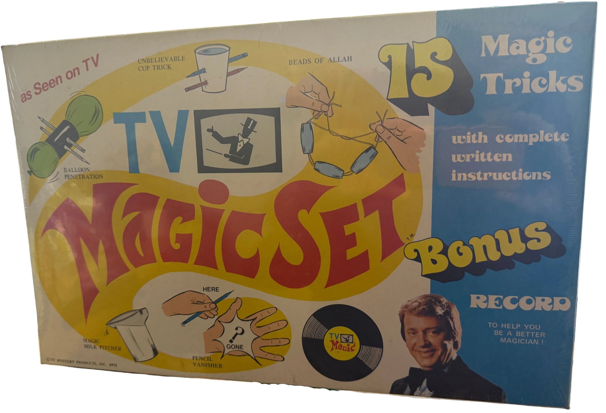 Vintage TV Magic Set packaging with colorful text and images on a desk.