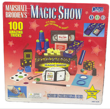 Marshall Brodien's Magic Show packaging on a table with various items.