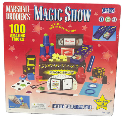 Marshall Brodien's Magic Show packaging on a table with various items.