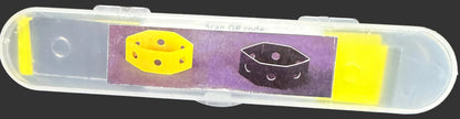 Small rectangular object with purple and yellow design on a map background