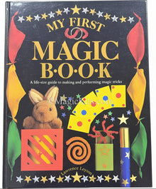 Children's book titled 'My First Magic Book' with colorful illustrations on a black background.
