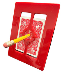 Red tray with playing cards and a yellow pencil on a map background